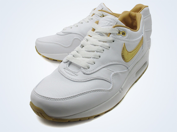 white and gold nike air